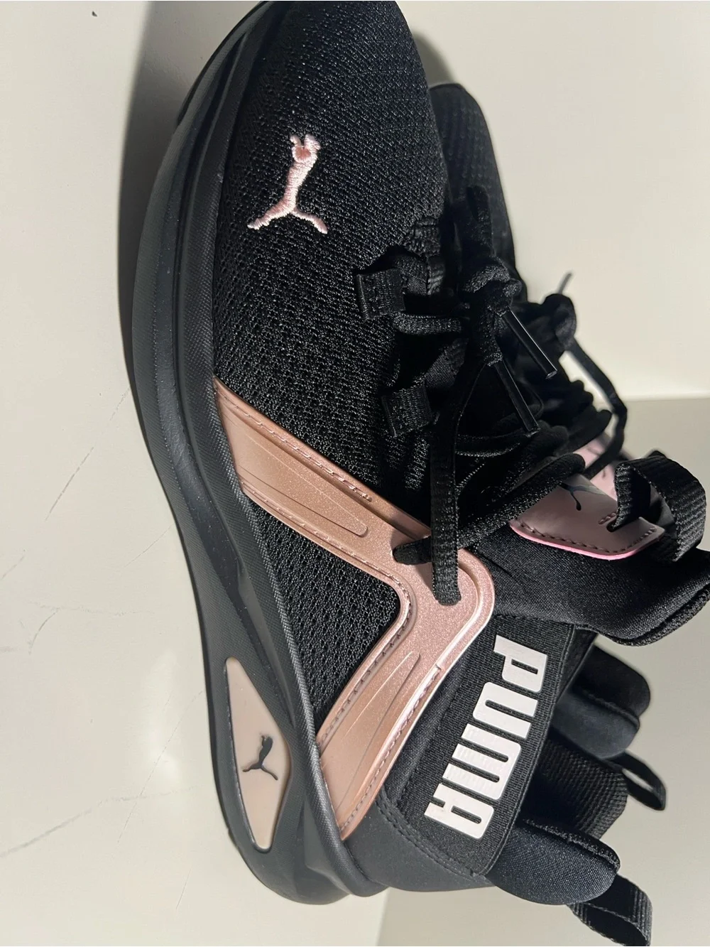 Puma Women's Black with Rose Gold Accent Athletic Sneakers